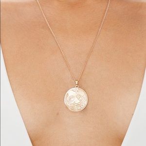gold angel medallion necklace